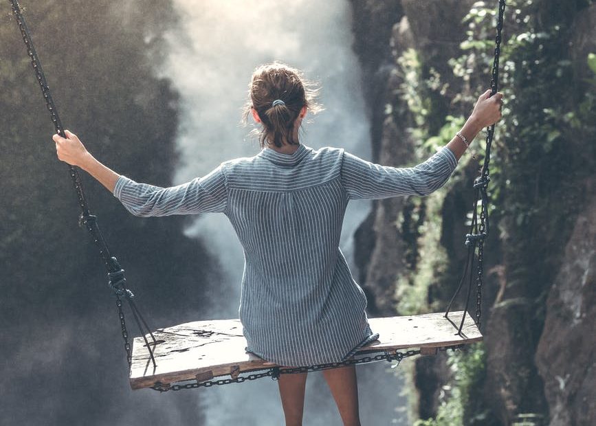 woman wearing grey long sleeved top photography